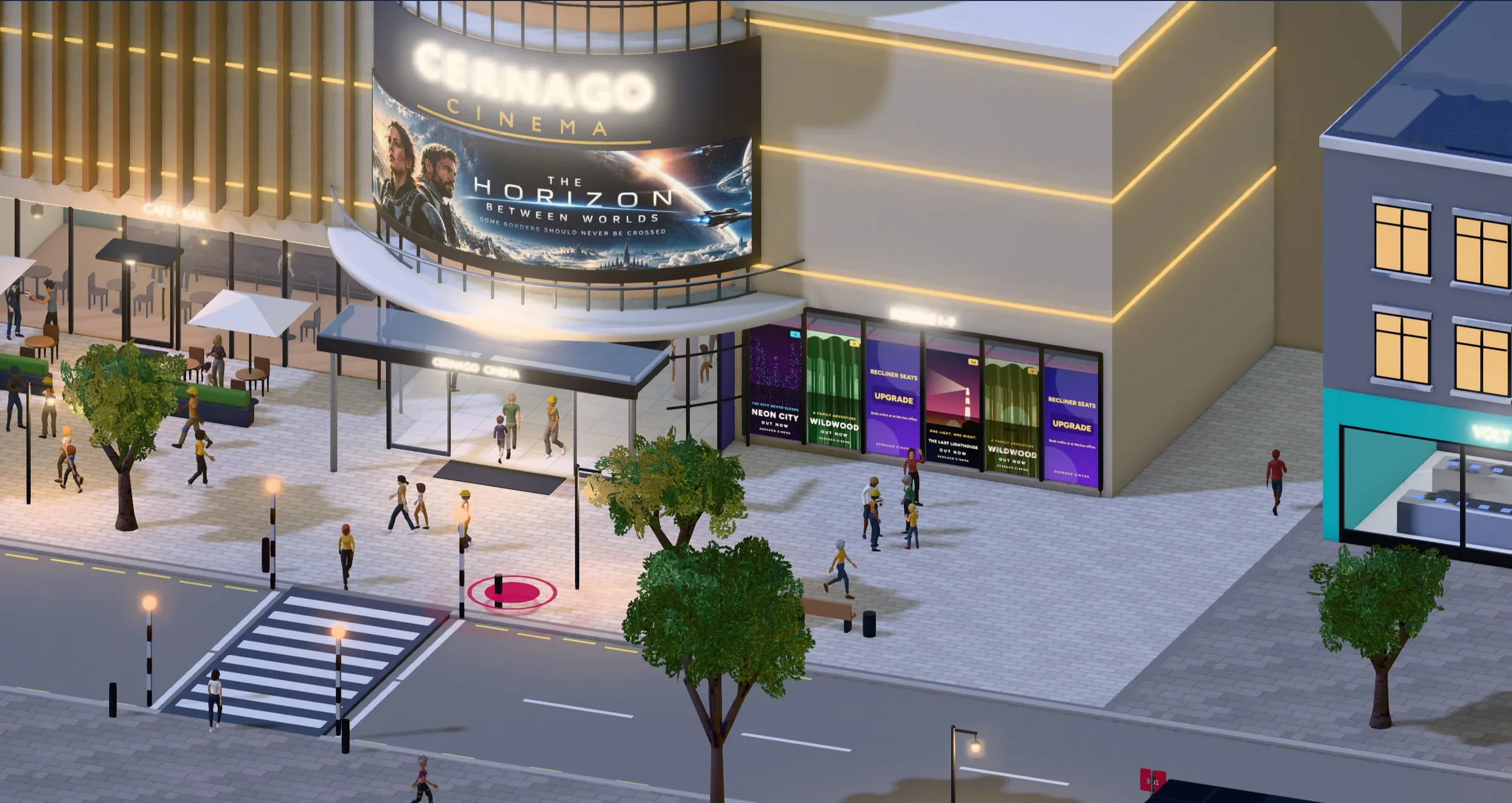A curved LED screen over a cinema entrance at night