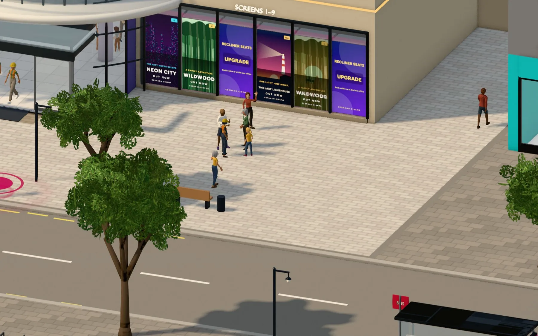 Portrait screens along a cinema front, each playing an advert